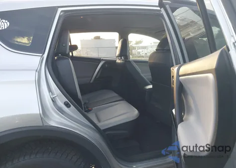 2018 Toyota Rav4 Limited z USA, uszkodzony, nr VIN JTMDFREV6JJ211708